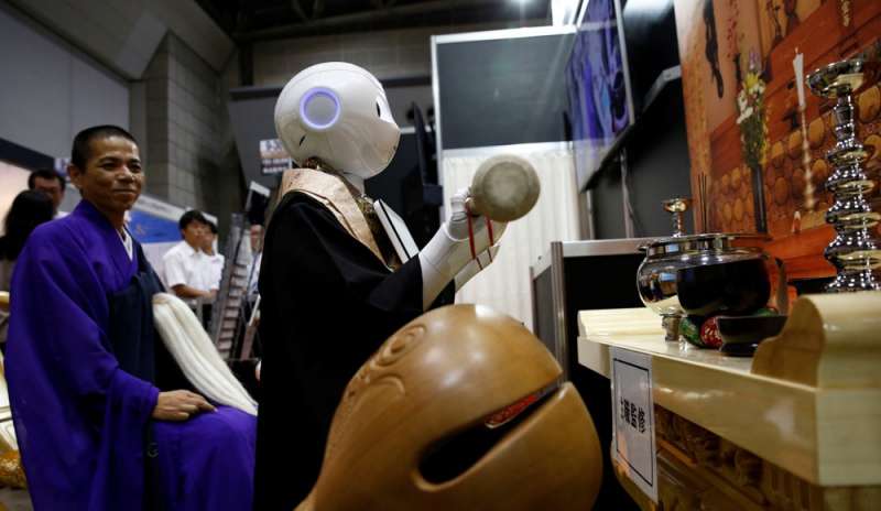 Buddismo low-cost: arrivano i “sacerdoti robot”